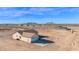 Spacious single-Gathering home featuring a two-car garage, neutral stucco and desert landscaping at 37504 W Elm Ave, Tonopah, AZ 85354
