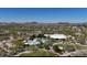 Scenic aerial perspective highlighting the recreation center with pools and tennis courts amidst the Aviano community's beautiful homes at 3804 E Daley Ln, Phoenix, AZ 85050