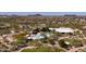 An aerial view of the recreation center showcasing pools, tennis courts, and lush landscaping nestled in the Aviano community at 3804 E Daley Ln, Phoenix, AZ 85050
