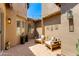 Charming courtyard featuring comfortable seating, string lights, and well-maintained landscaping at 3804 E Daley Ln, Phoenix, AZ 85050