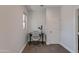 This office features a modern chair, black desk, and neutral colors, offering an excellent space at 3804 E Daley Ln, Phoenix, AZ 85050