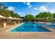 Resort-style pool with lap lanes surrounded by comfortable seating and shade, perfect for relaxation and recreation at 3804 E Daley Ln, Phoenix, AZ 85050
