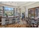 Farmhouse kitchen featuring a large island, custom cabinetry, stainless appliances and a breakfast nook at 41916 N 101St N Pl, Scottsdale, AZ 85262