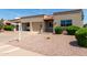 Attractive single-story home features a desert landscape, an attached garage and a welcoming facade at 4502 E Carol Ave # 4, Mesa, AZ 85206