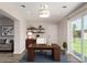 Well-lit office space with modern furnishings, ideal for working from home or managing personal affairs at 4502 E Carol Ave # 4, Mesa, AZ 85206