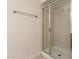 Bright, updated bathroom featuring a glass shower door and neutral colors at 4808 N 24Th St # 923, Phoenix, AZ 85016