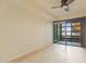 Bedroom featuring a ceiling fan and access to a private balcony through sliding glass doors at 4808 N 24Th St # 923, Phoenix, AZ 85016