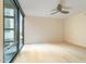 Bright bedroom featuring an open floor plan, large windows, and ceiling fan at 4808 N 24Th St # 923, Phoenix, AZ 85016