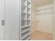 Walk-in closet with built-in shelving for ample storage at 4808 N 24Th St # 923, Phoenix, AZ 85016
