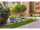 Peaceful courtyard with fountain and lush landscaping, offering a serene escape from city life at 4808 N 24Th St # 923, Phoenix, AZ 85016