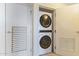 Convenient laundry area with stacked washer and dryer units inside a closet at 4808 N 24Th St # 923, Phoenix, AZ 85016