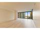 Bright living room with large windows offering city views and light hardwood floors at 4808 N 24Th St # 923, Phoenix, AZ 85016