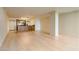 Open living space featuring hardwood floors, a kitchen area, and an abundance of natural light at 4808 N 24Th St # 923, Phoenix, AZ 85016