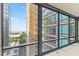 A scenic view of the city and surrounding buildings seen from a window at 4808 N 24Th St # 923, Phoenix, AZ 85016