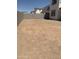 A large, flat backyard area enclosed by a block wall, perfect for creating an outdoor oasis at 4930 W Brown St, Glendale, AZ 85302