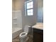 Cozy bathroom featuring a shower and tub combo, ideal for relaxation at 4930 W Brown St, Glendale, AZ 85302