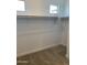 Efficient walk-in closet with single-shelf storage, perfect for a modern home buyer at 4930 W Brown St, Glendale, AZ 85302