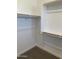 This walk-in closet boasts ample shelving and storage space for your wardrobe needs at 4930 W Brown St, Glendale, AZ 85302