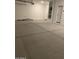 Clean two-car garage with new epoxy flooring and ample space for storage at 4930 W Brown St, Glendale, AZ 85302