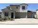 Charming two-story home with a three car garage and manicured landscaping at 5004 W Brown St, Glendale, AZ 85302