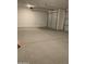 Spacious garage with an automatic door and concrete floor, offering plenty of room at 5004 W Brown St, Glendale, AZ 85302