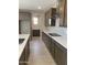 Spacious kitchen featuring ample counter space and stainless steel appliances at 5004 W Brown St, Glendale, AZ 85302