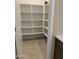 Walk-in pantry with lots of shelving and plenty of storage space at 5004 W Brown St, Glendale, AZ 85302