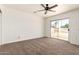 Bedroom with sliding glass door to backyard at 501 W Dublin St, Chandler, AZ 85225