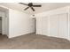 Spacious bedroom with ceiling fan and closet space at 501 W Dublin St, Chandler, AZ 85225