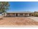 Charming single-story home featuring a covered carport, stone accents and low maintenance front yard at 501 W Dublin St, Chandler, AZ 85225