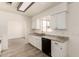 Bright kitchen featuring granite countertops, and updated appliances at 501 W Dublin St, Chandler, AZ 85225