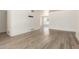 Bright living room with wood-look flooring and an open concept design at 501 W Dublin St, Chandler, AZ 85225