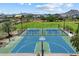 Aerial view of the neighborhood basketball court with mountain views and green landscaping at 5724 E Scarlet St, Mesa, AZ 85215