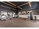 Community fitness center featuring modern exercise equipment and ample natural light at 5724 E Scarlet St, Mesa, AZ 85215