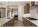 Stylish kitchen featuring stainless steel appliances, granite countertops, and ample cabinet space at 5724 E Scarlet St, Mesa, AZ 85215