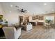 Spacious living room showcasing an open floor plan with a kitchen and dining area at 5724 E Scarlet St, Mesa, AZ 85215