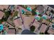 Aerial view of a property with a kidney-shaped pool and a well-maintained lawn, all enclosed within a private fence at 635 S Lanus Dr, Gilbert, AZ 85296