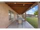 Covered patio with outdoor seating and ample space for entertaining at 635 S Lanus Dr, Gilbert, AZ 85296
