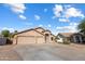 Beautiful house with a well-manicured front yard and spacious driveway at 635 S Lanus Dr, Gilbert, AZ 85296