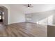Open concept living room featuring wood-look floors and vaulted ceilings at 635 S Lanus Dr, Gilbert, AZ 85296
