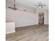 Spacious living room featuring wood-look floors, vaulted ceilings and an open concept at 635 S Lanus Dr, Gilbert, AZ 85296