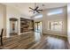 Inviting living room blends seamlessly with kitchen area and features hardwood floors at 635 S Lanus Dr, Gilbert, AZ 85296