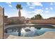 Beautiful pool area with mature landscaping and a privacy fence at 635 S Lanus Dr, Gilbert, AZ 85296