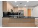 Kitchen features modern appliances and granite countertops at 7117 E Rancho Vista Dr # 3010, Scottsdale, AZ 85251