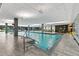 The indoor pool area features lots of natural light, a seating area, and easy access to gym at 7117 E Rancho Vista Dr # 3010, Scottsdale, AZ 85251