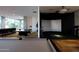 Stylish game room with pool table and simulated golf range for entertaining at 7180 E Kierland Blvd # 1116, Scottsdale, AZ 85254