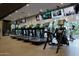 Modern gym with treadmills, ellipticals, and large windows for a bright workout at 7180 E Kierland Blvd # 1116, Scottsdale, AZ 85254