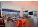 Contemporary living room boasting city views, stylish furniture, and wood flooring at 7180 E Kierland Blvd # 1116, Scottsdale, AZ 85254