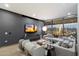 Spacious living room with modern decor, city views, and comfortable seating arrangement at 7180 E Kierland Blvd # 1116, Scottsdale, AZ 85254