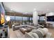 Open-concept living room featuring panoramic city views, modern furnishings, and ample natural light at 7180 E Kierland Blvd # 1116, Scottsdale, AZ 85254